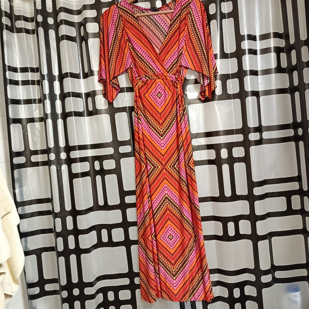 **✨ Effortless Elegance – The Enfocus Maxi Dress with Flutter Sleeves! ✨**